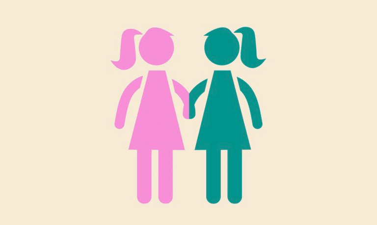 Teal woman holding pink woman's hand